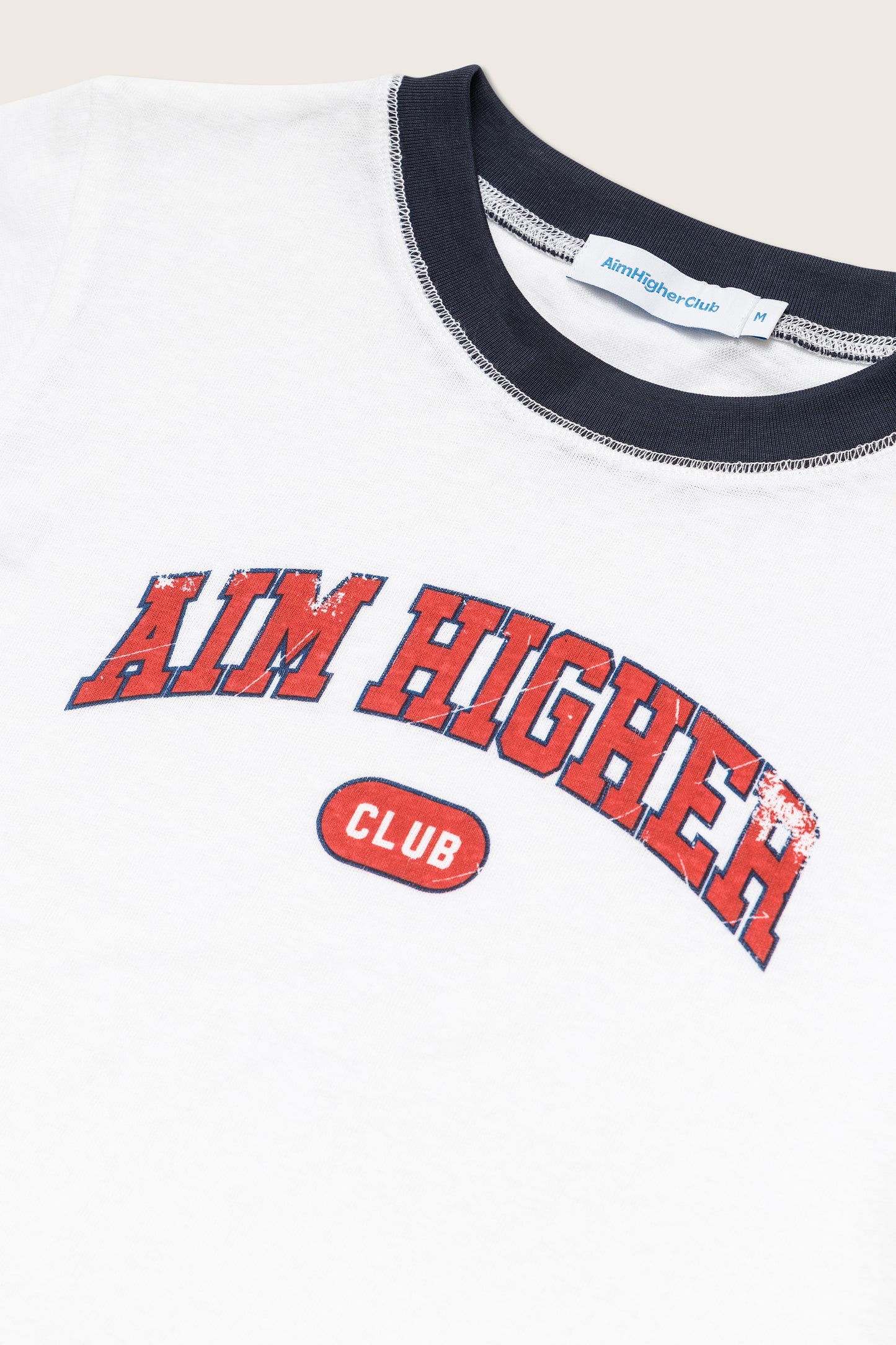 Aim Higher Club Ruffle Ringer Tee/ Off White