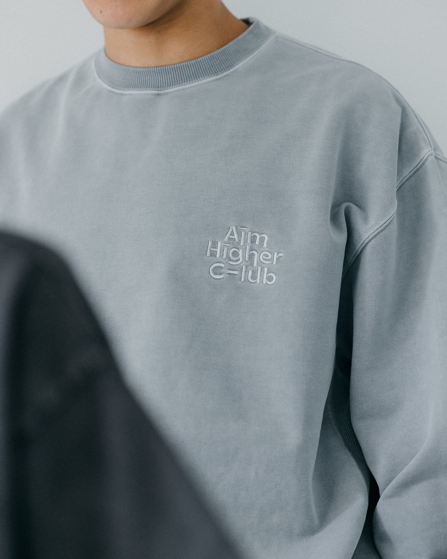 Aim Higher Club Unisex Crewneck Sweatshirt/ Washed Powder Blue Grey