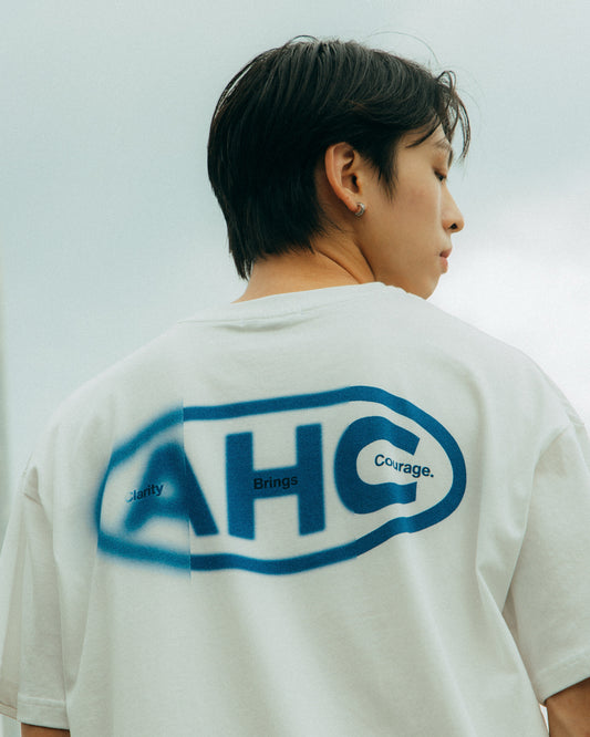Aim Higher Club × Orbis Clarity Brings Courage Unisex Logo Tee/ White
