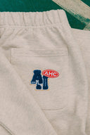 Aim Higher Club Unisex College Badge Sweatpants/ Oat
