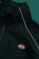 Aim Higher Club Unisex College Emblem Reflective Half Zip Windbreaker/ Black