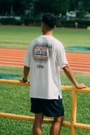 Aim Higher Club Unisex Track Graphic Tee/ Off White