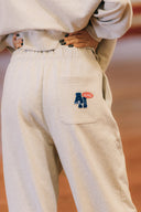 Aim Higher Club Unisex College Badge Sweatpants/ Oat