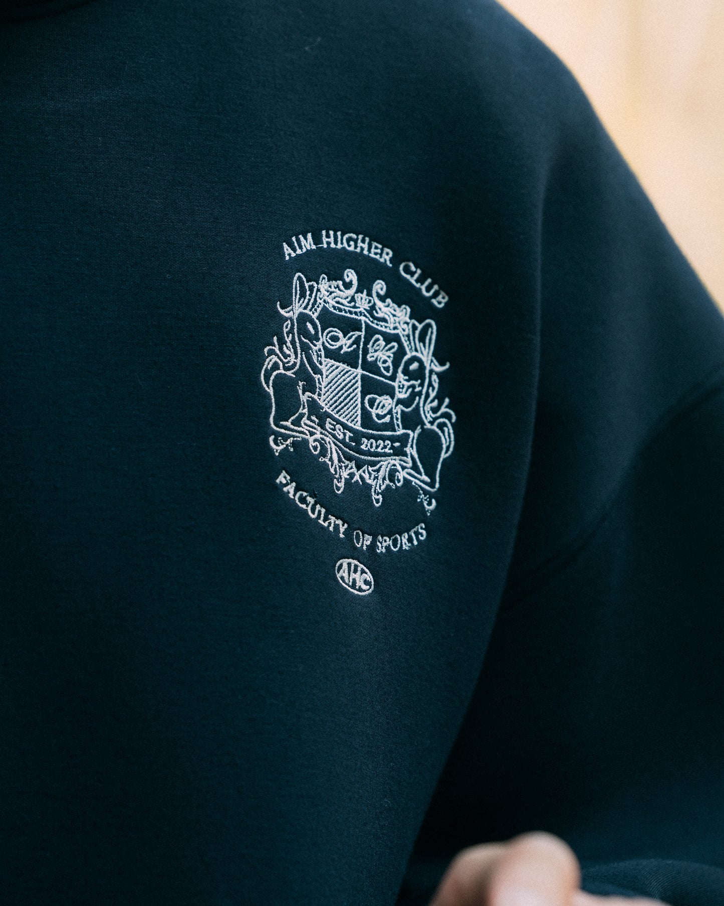 Aim Higher Club Unisex Faculty of Sports Emblem Soft Hoodie/ Navy