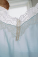 Aim Higher Club Core Asymmetric Lace Camisole Top/ Baby Blue
